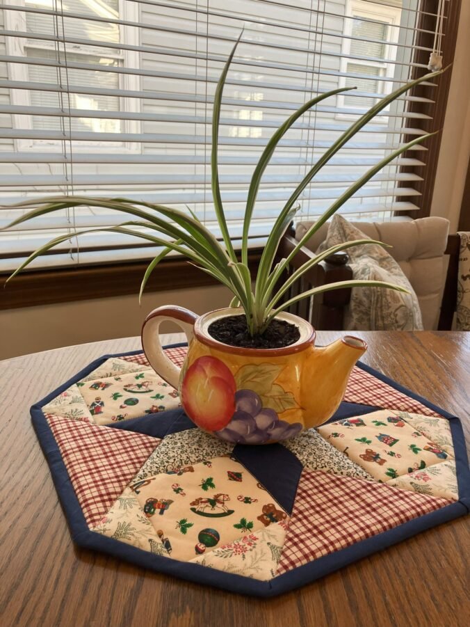 Spidey in teapot on Cookie Crumb Catcher Mat